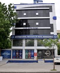 Institute of Hotel Management Ahmedabad Logo